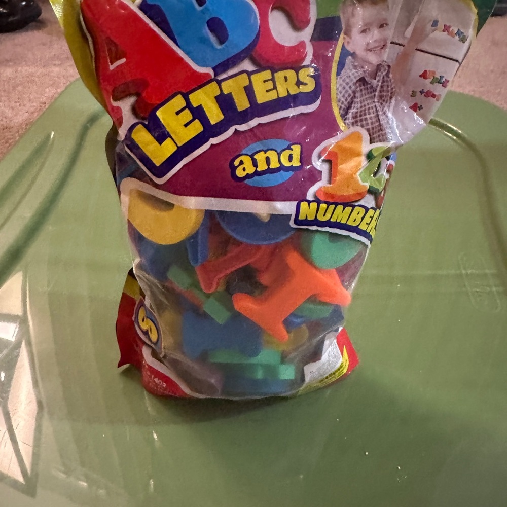 Assorted abc letters and numbers magnets good condition